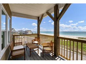 Oceanside Oasis by the sea with poolside marsh views, firepit, and picnic tables