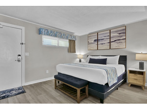 Elegant, serene bedroom showcasing a comfortable king-size bed