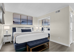 Tranquil, spacious bedroom with a luxurious king-size bed